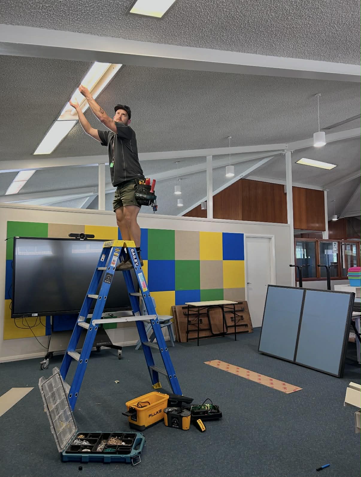 Hayden Brown installing lighting in Braidwood